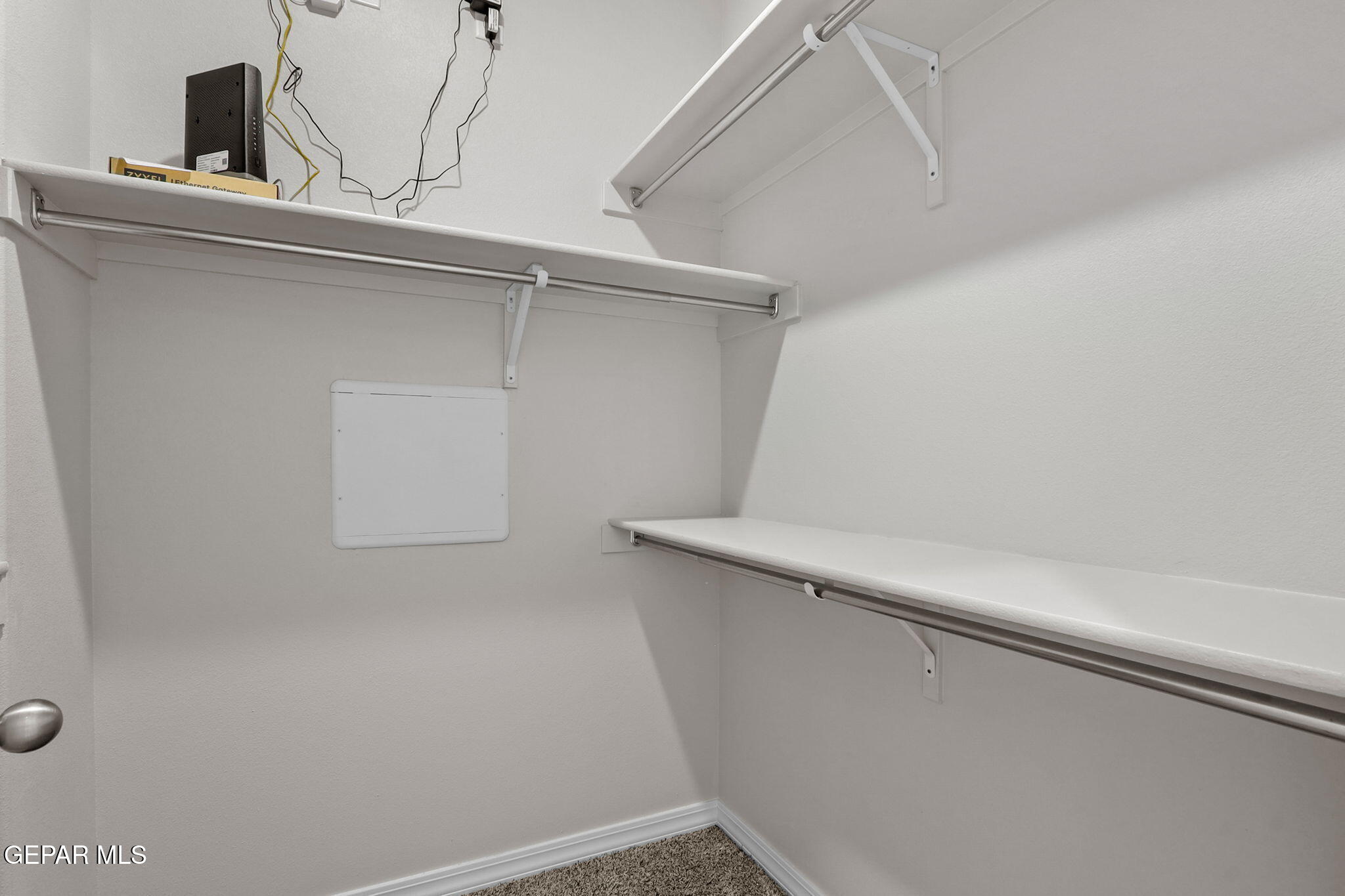 12420 Fill Ball El Paso, TX 79928 - Photo 44 of 47 a view of a room with racks on the wall