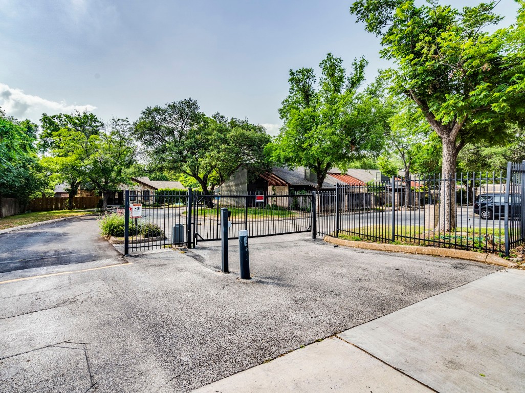 3815 Menchaca Road, Unit 19 Austin, TX 78704 - Photo 14 of 14 a view of a park with swings