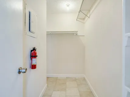 a bathroom with a sink toilet vanity and shower