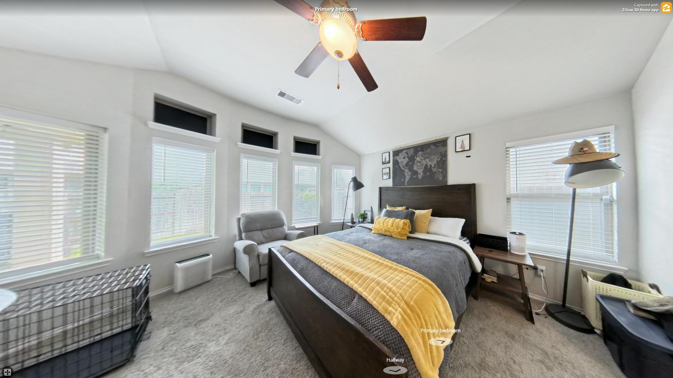 718 Santa Elena Trail Conroe, TX 77304 - Photo 12 of 29 Discover serenity in this inviting primary bedroom, featuring abundant natural light, a cozy layout, and stylish accents that promise restful nights and rejuvenating mornings.