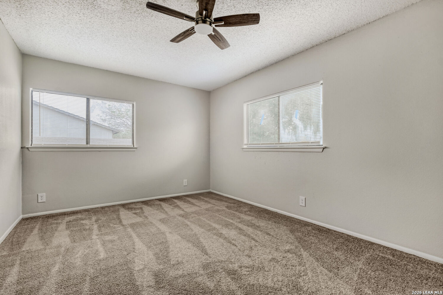 8264 Longhorn Ridge Drive Converse, TX 78109 - Photo 12 of 17 an empty room with windows
