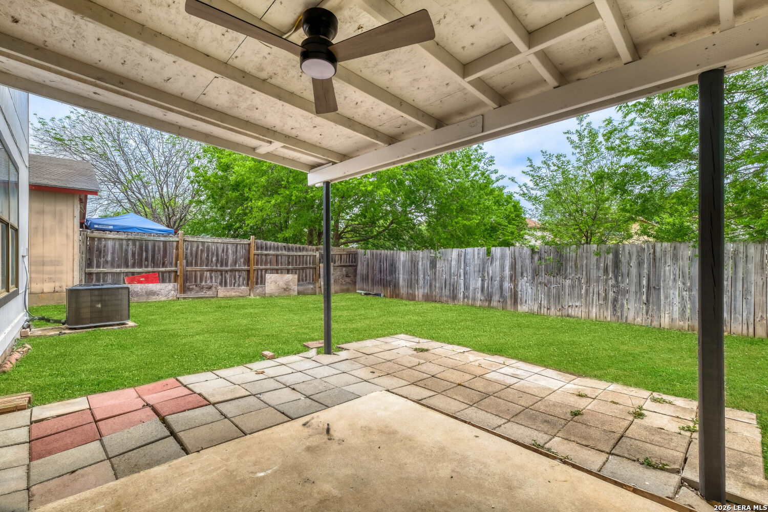 8264 Longhorn Ridge Drive Converse, TX 78109 - Photo 15 of 17 a view of a backyard with a garden