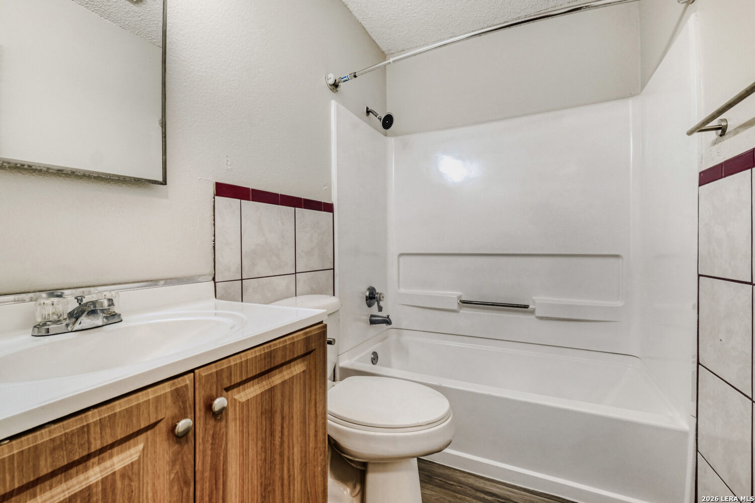 8264 Longhorn Ridge Drive Converse, TX 78109 - Photo 9 of 17 a bathroom with a sink a toilet and shower