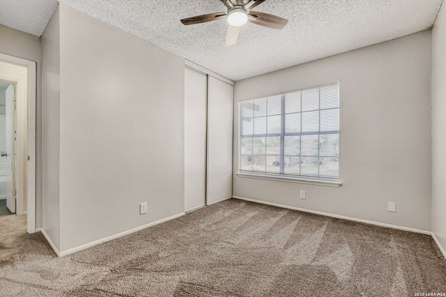 8264 Longhorn Ridge Drive Converse, TX 78109 - Photo 10 of 17 a view of an empty room with a window