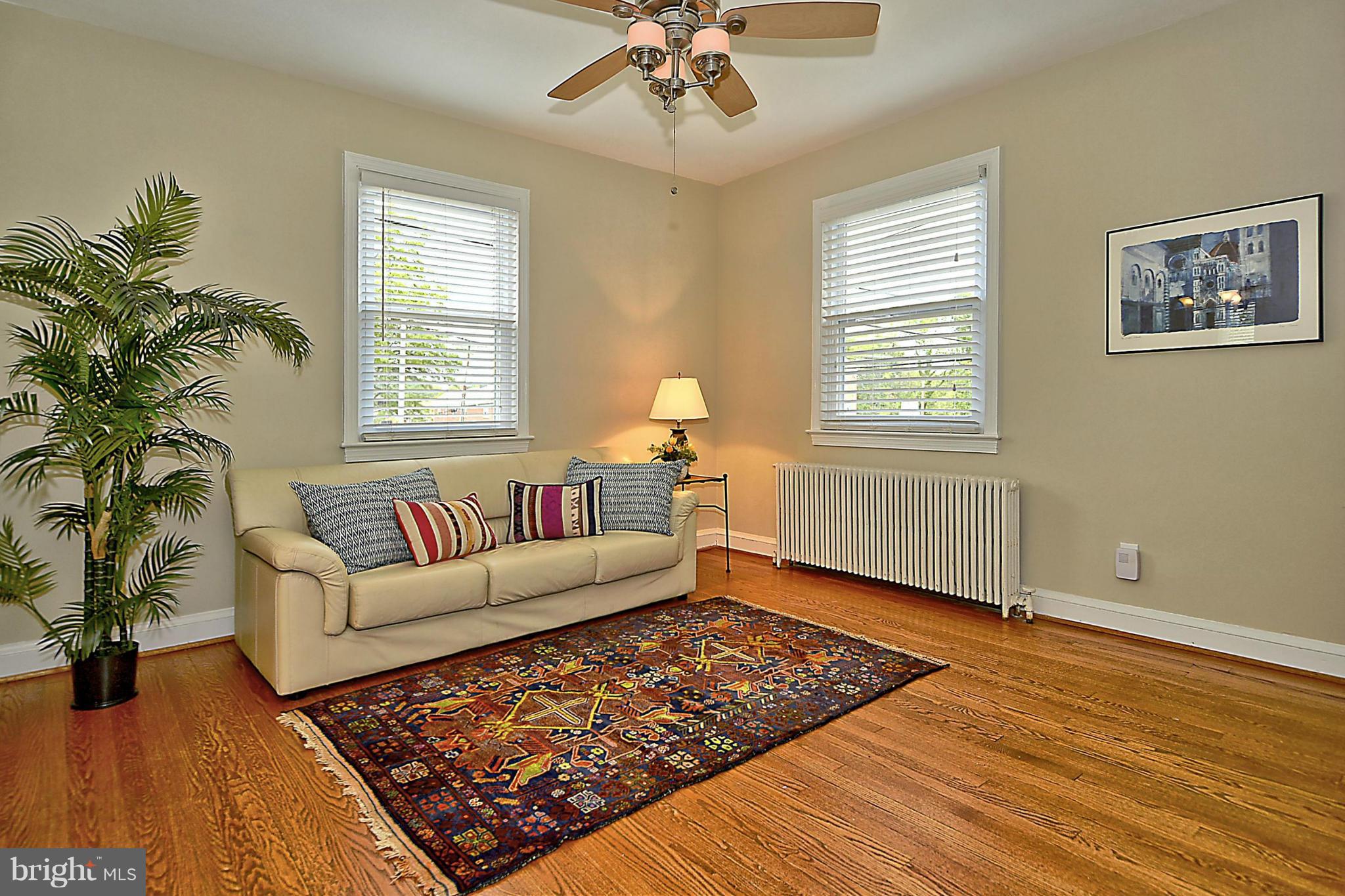 200 South Courthouse Road Arlington, VA 22204 - Photo 3 of 30 a living room with furniture and a window