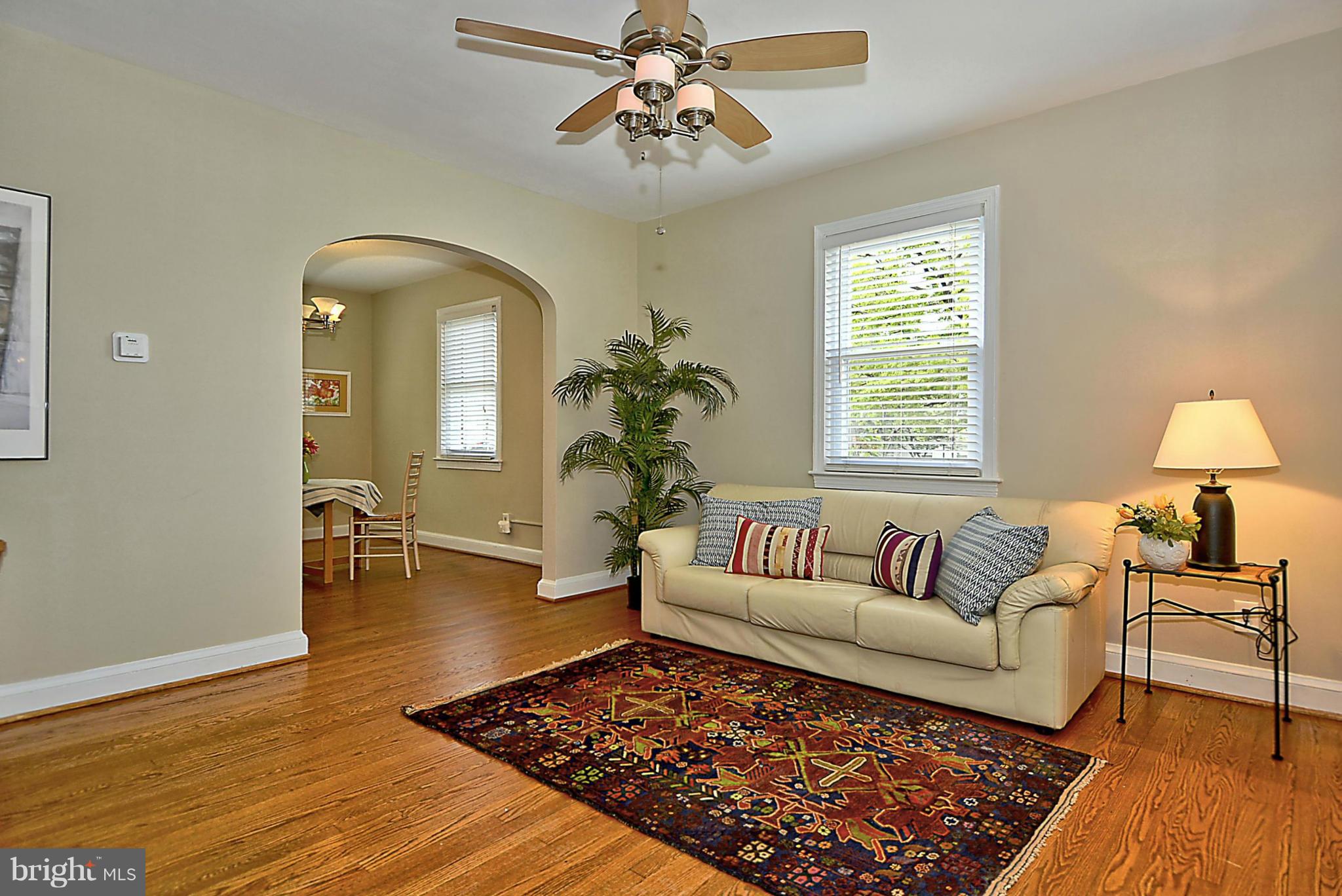 200 South Courthouse Road Arlington, VA 22204 - Photo 4 of 30 a living room with furniture and a chandelier