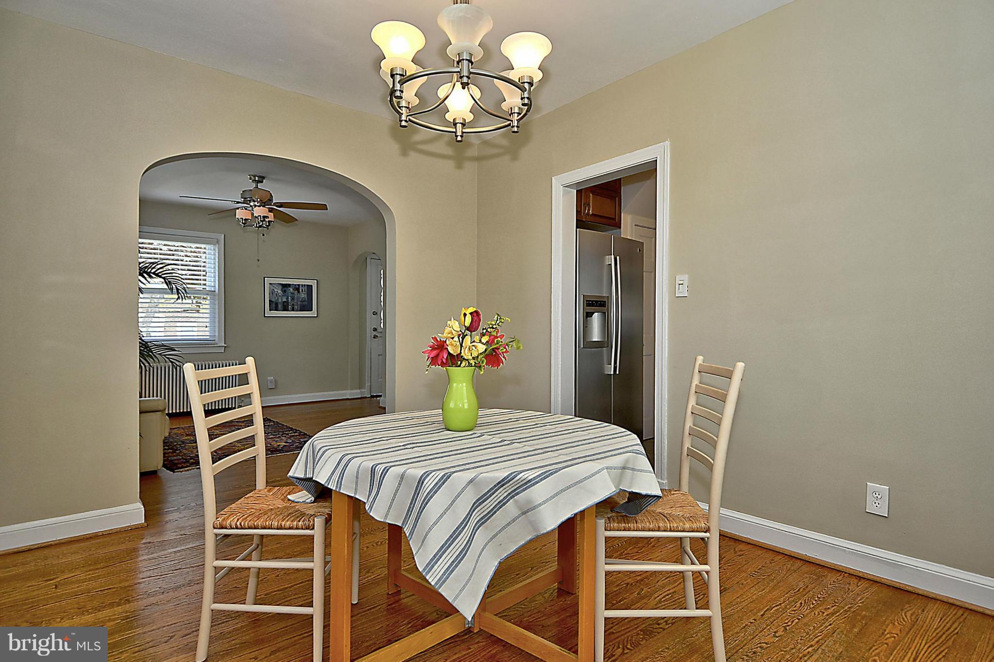 200 South Courthouse Road Arlington, VA 22204 - Photo 7 of 30 a bedroom with a bed and wooden floor
