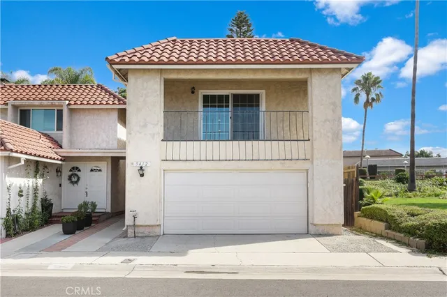 a view of a house with a terrace