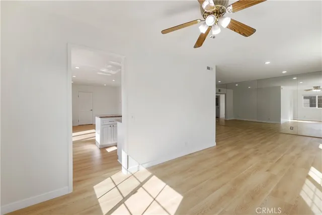 a kitchen with stainless steel appliances a refrigerator stove microwave and sink