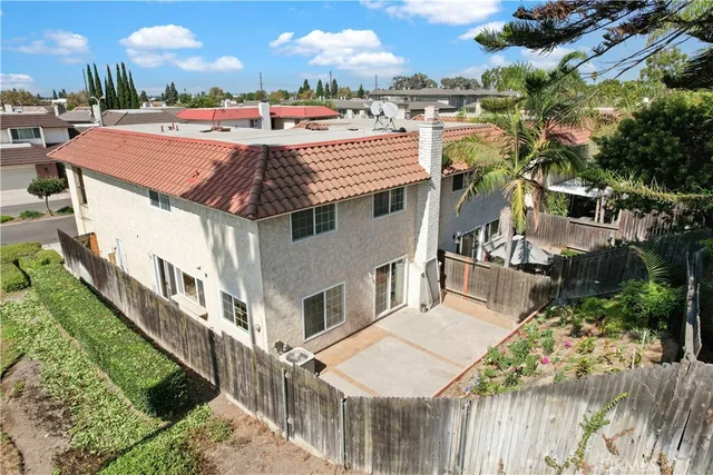 an aerial view of a house with a garden