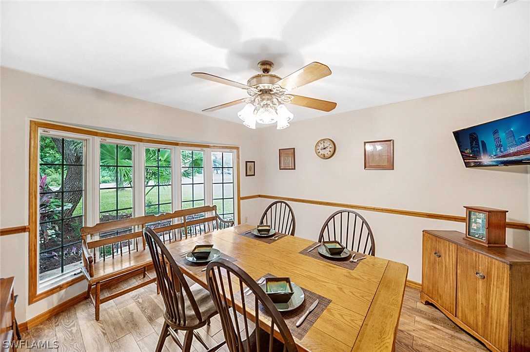 10244 Horizon Drive Spring Hill, FL 34608 - Photo 12 of 35 a view of a dining room with furniture window and outside view