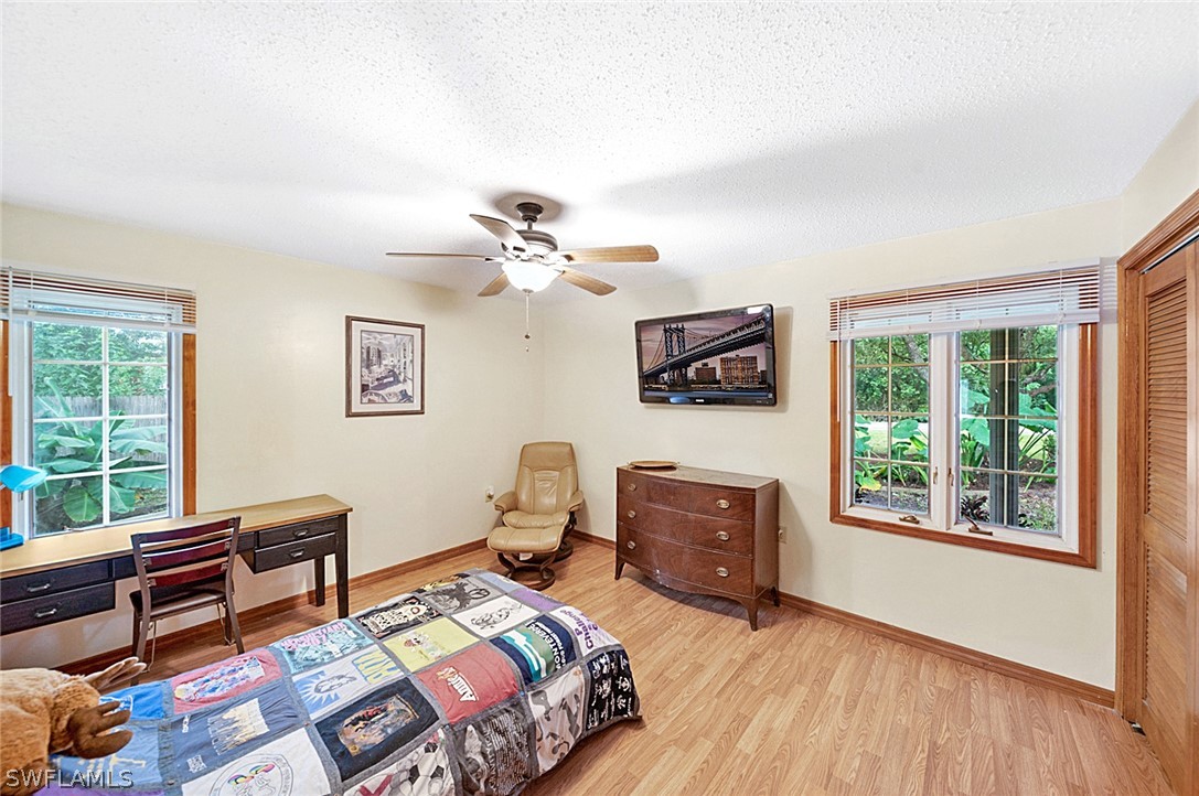10244 Horizon Drive Spring Hill, FL 34608 - Photo 23 of 35 a bedroom with furniture and a window