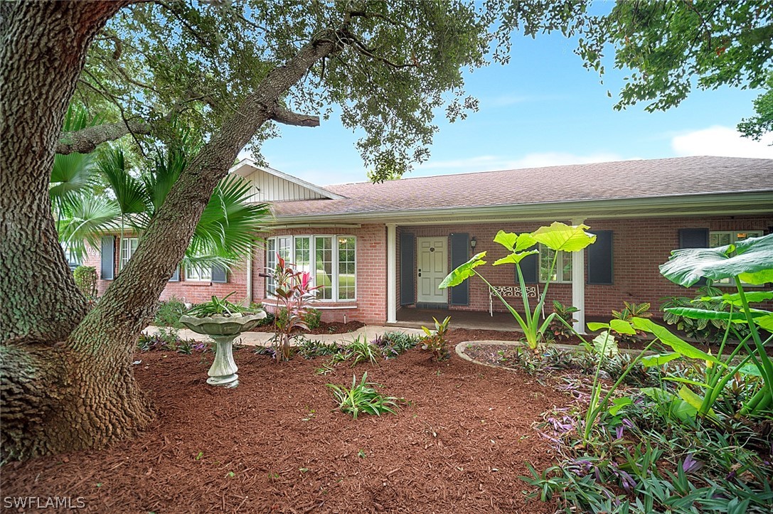 10244 Horizon Drive Spring Hill, FL 34608 - Photo 6 of 35 a garden view with a seating space