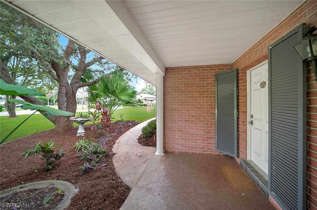 10244 Horizon Drive Spring Hill, FL 34608 - Photo 8 of 35 a view of a pathway with a porch