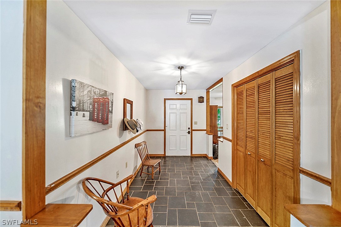 10244 Horizon Drive Spring Hill, FL 34608 - Photo 10 of 35 a view of a hallway with furniture
