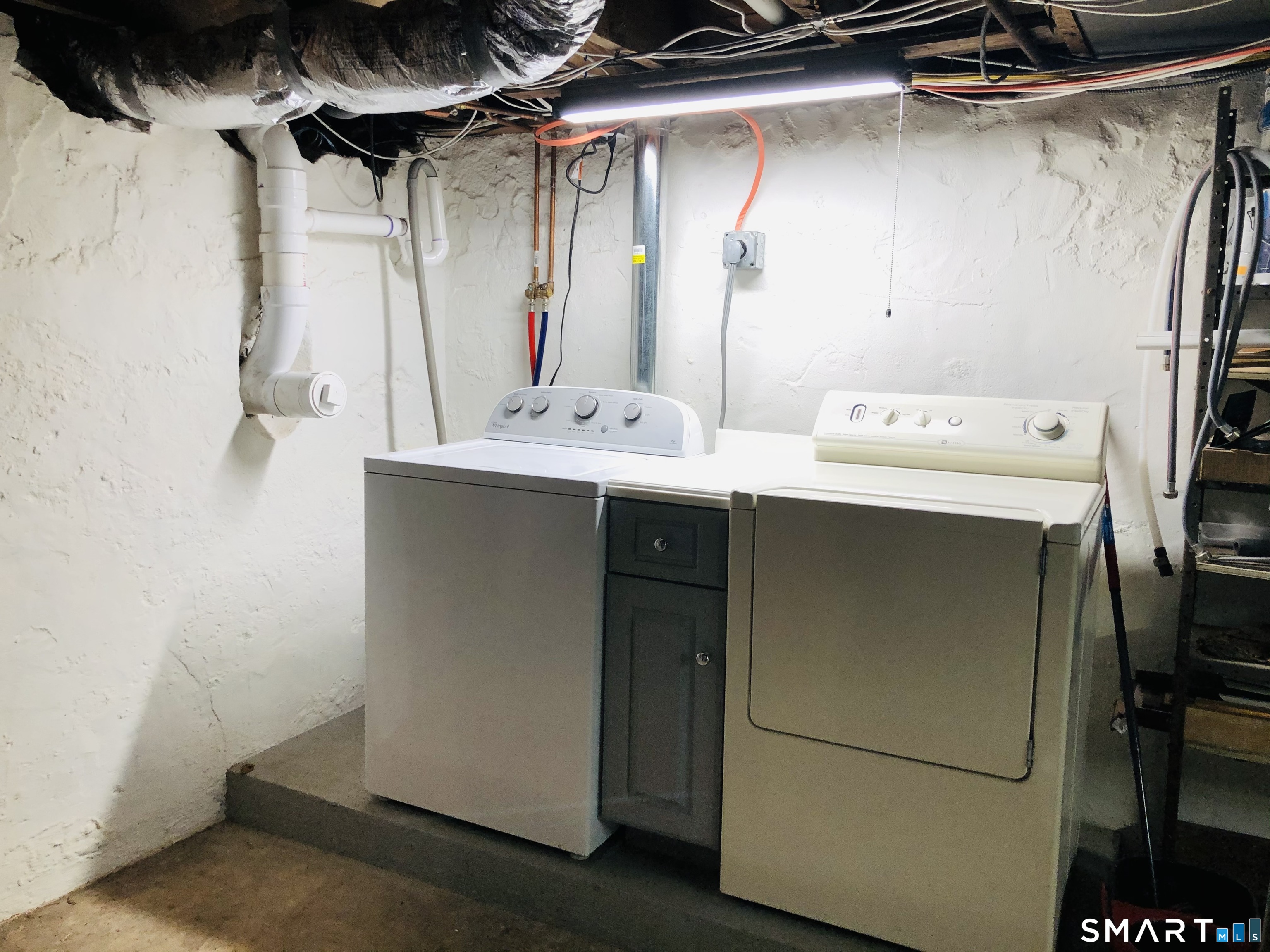 16 Cowing Terrace Stamford, CT 06906 - Photo 17 of 24 a utility room with dryer and washer