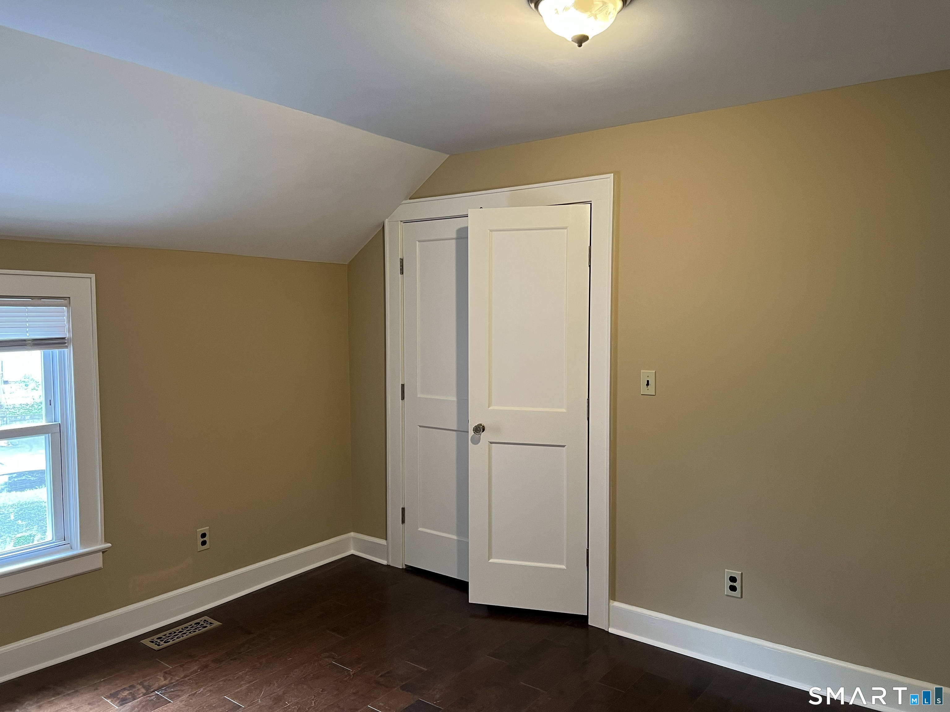 16 Cowing Terrace Stamford, CT 06906 - Photo 9 of 24 an empty room with windows