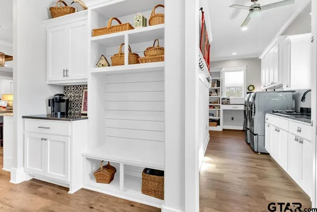 a kitchen with stainless steel appliances a refrigerator and a sink