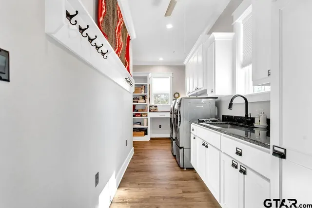 a utility room with dryer and washer