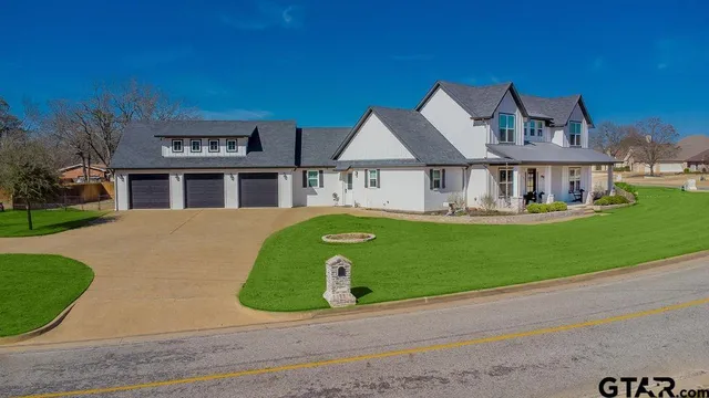 a view of bedroom with furniture and wooden floor