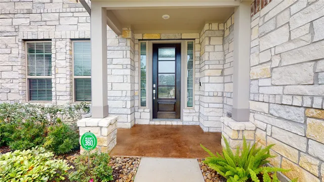 a front view of a house with an outdoor space