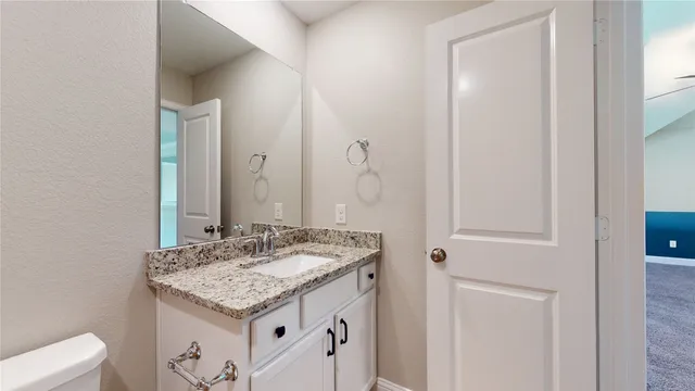 a view of staircase with rug floor