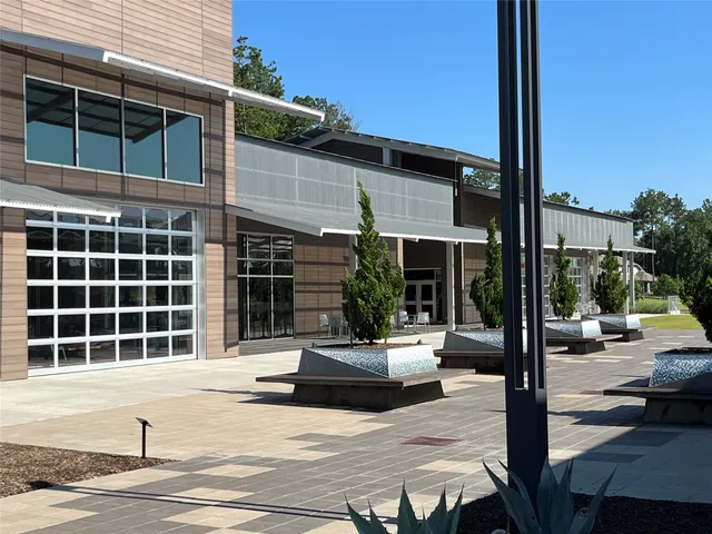 a view of a building with sitting area
