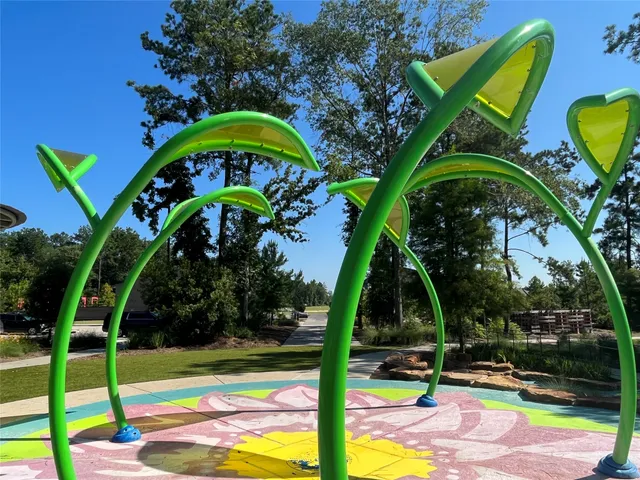 a view of swimming pool with a backyard and slide