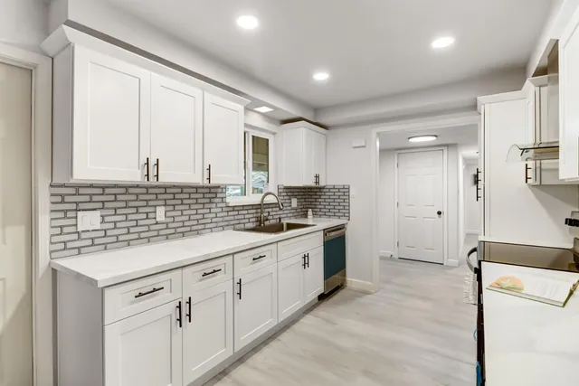 a kitchen with a stove and a microwave