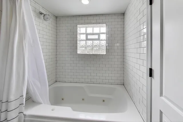 a bathroom with a bathtub