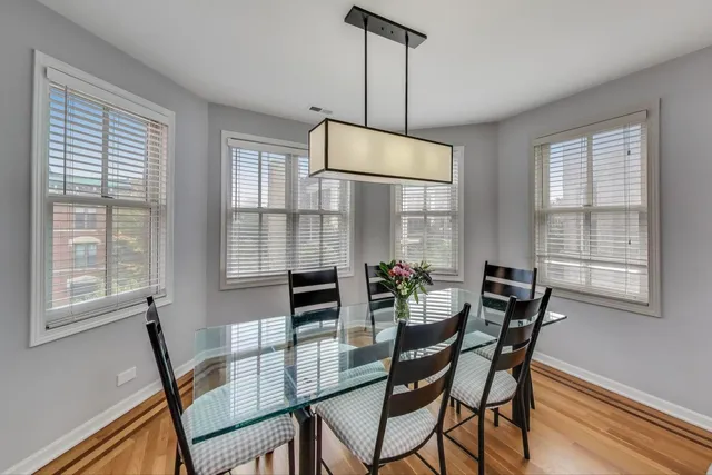 a view of a dining room with furniture window and outside view