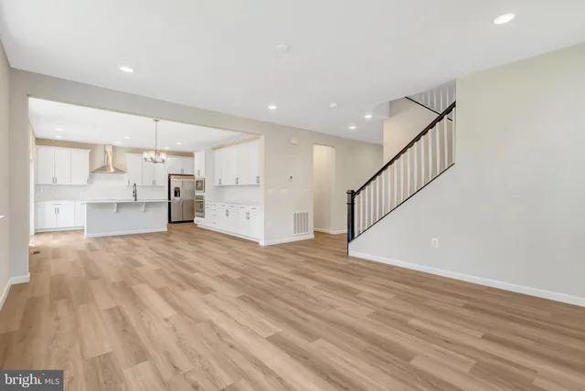 a large kitchen with cabinets