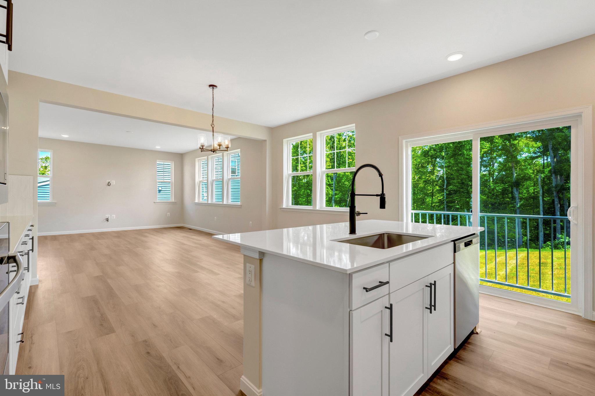 35670 Aspen Way Locust Grove, VA 22508 - Photo 23 of 60 a kitchen with a sink cabinets and wooden floor
