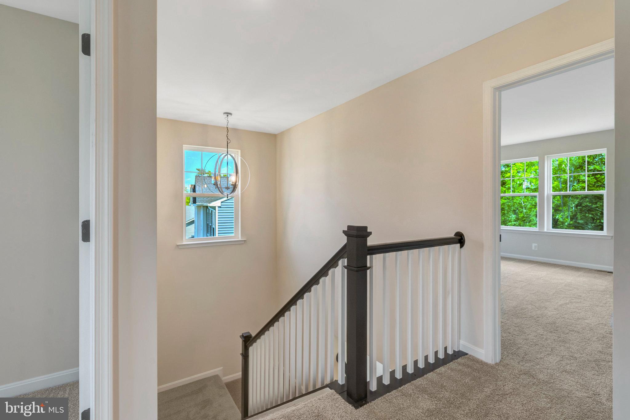 35670 Aspen Way Locust Grove, VA 22508 - Photo 33 of 60 a view of hallway with window and stairs