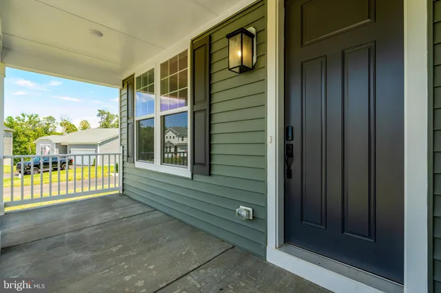 a view of a porch of a house