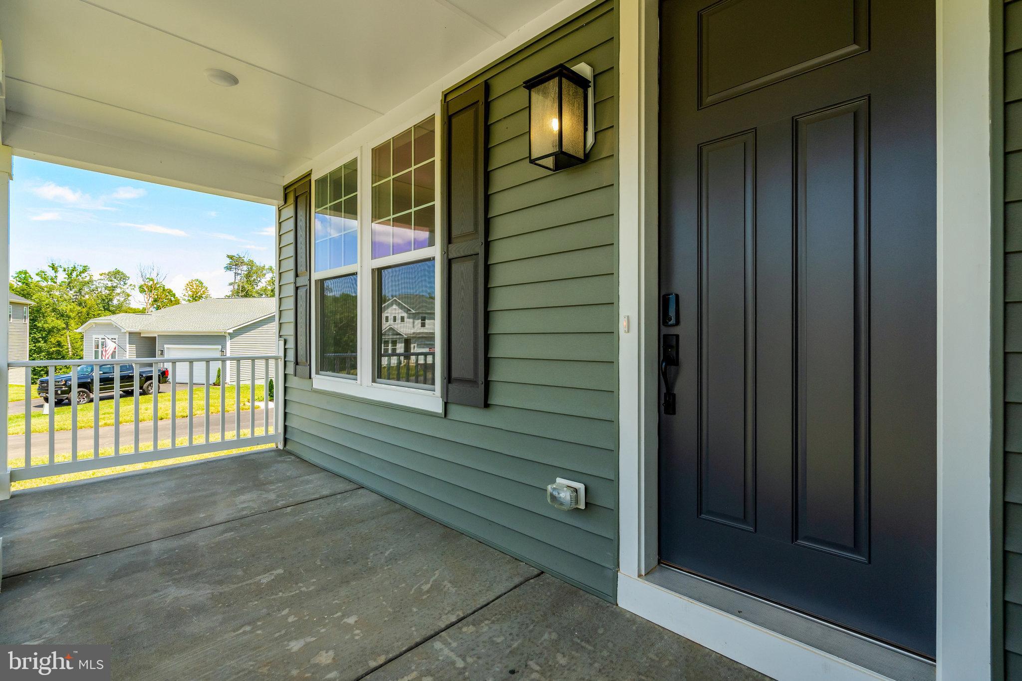 35670 Aspen Way Locust Grove, VA 22508 - Photo 4 of 60 a view of front door and porch