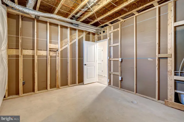 a house view with swimming pool in front of it