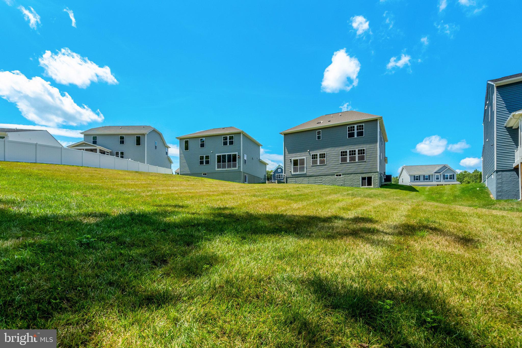 35670 Aspen Way Locust Grove, VA 22508 - Photo 56 of 60 a house view with swimming pool in front of it