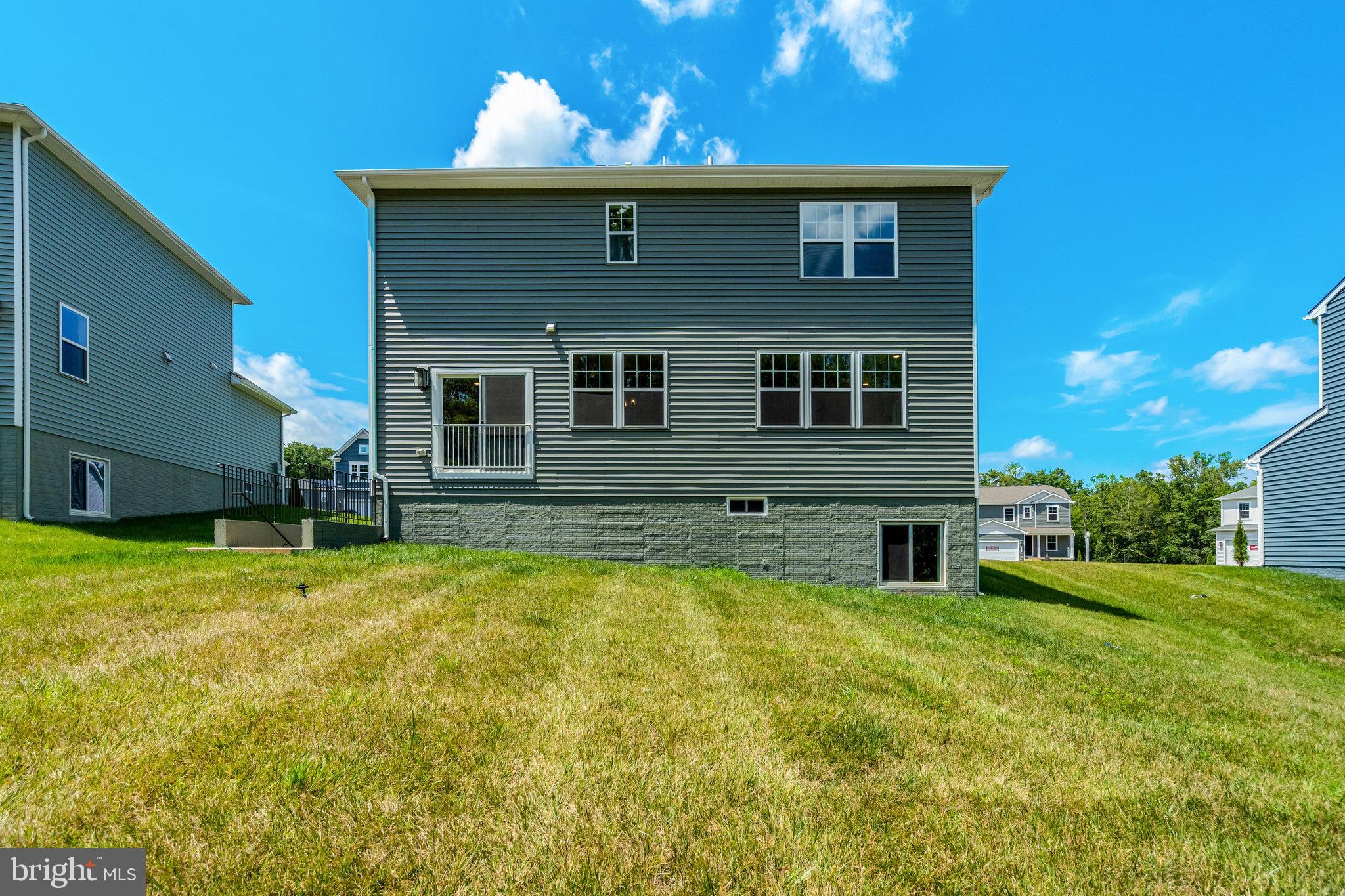 35670 Aspen Way Locust Grove, VA 22508 - Photo 59 of 60 a view of a house with a yard