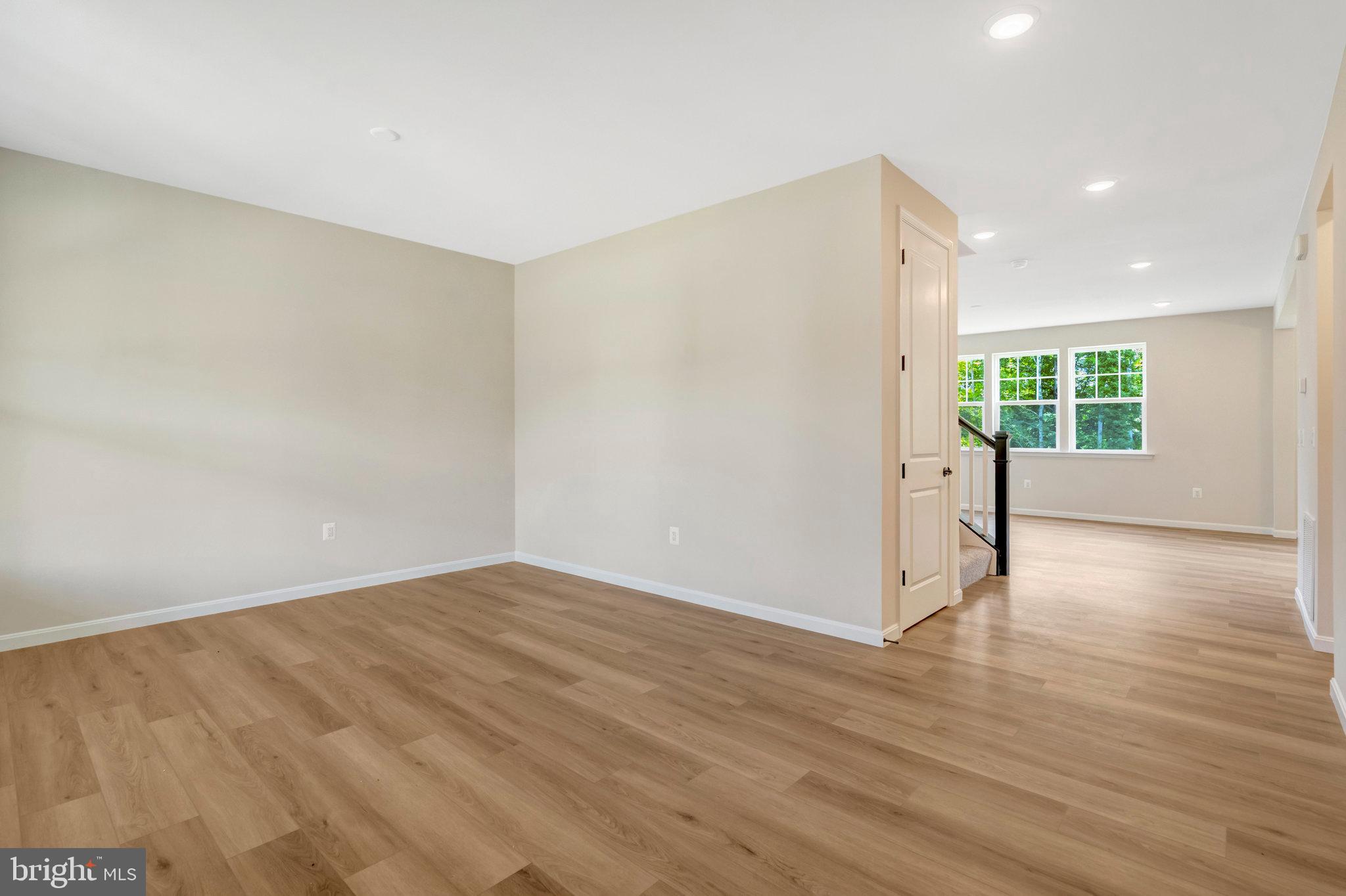 35670 Aspen Way Locust Grove, VA 22508 - Photo 6 of 60 wooden floor in an empty room with a window