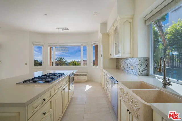 a view of a balcony with wooden fence and floor