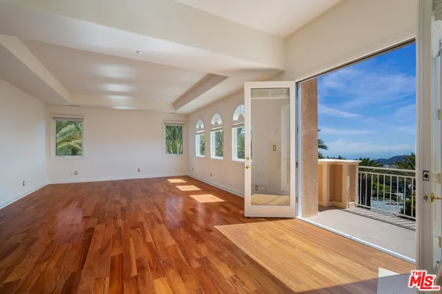 a living room with granite countertop furniture and fireplace