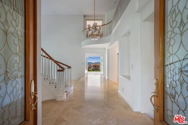 a view of an entryway with a livingroom