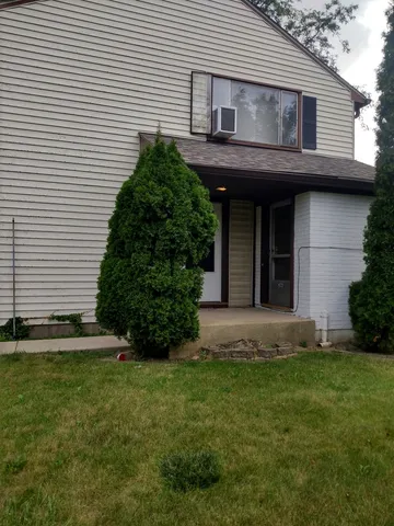 a house view with a garden space