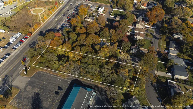 a view of building with glass door and outdoor shower