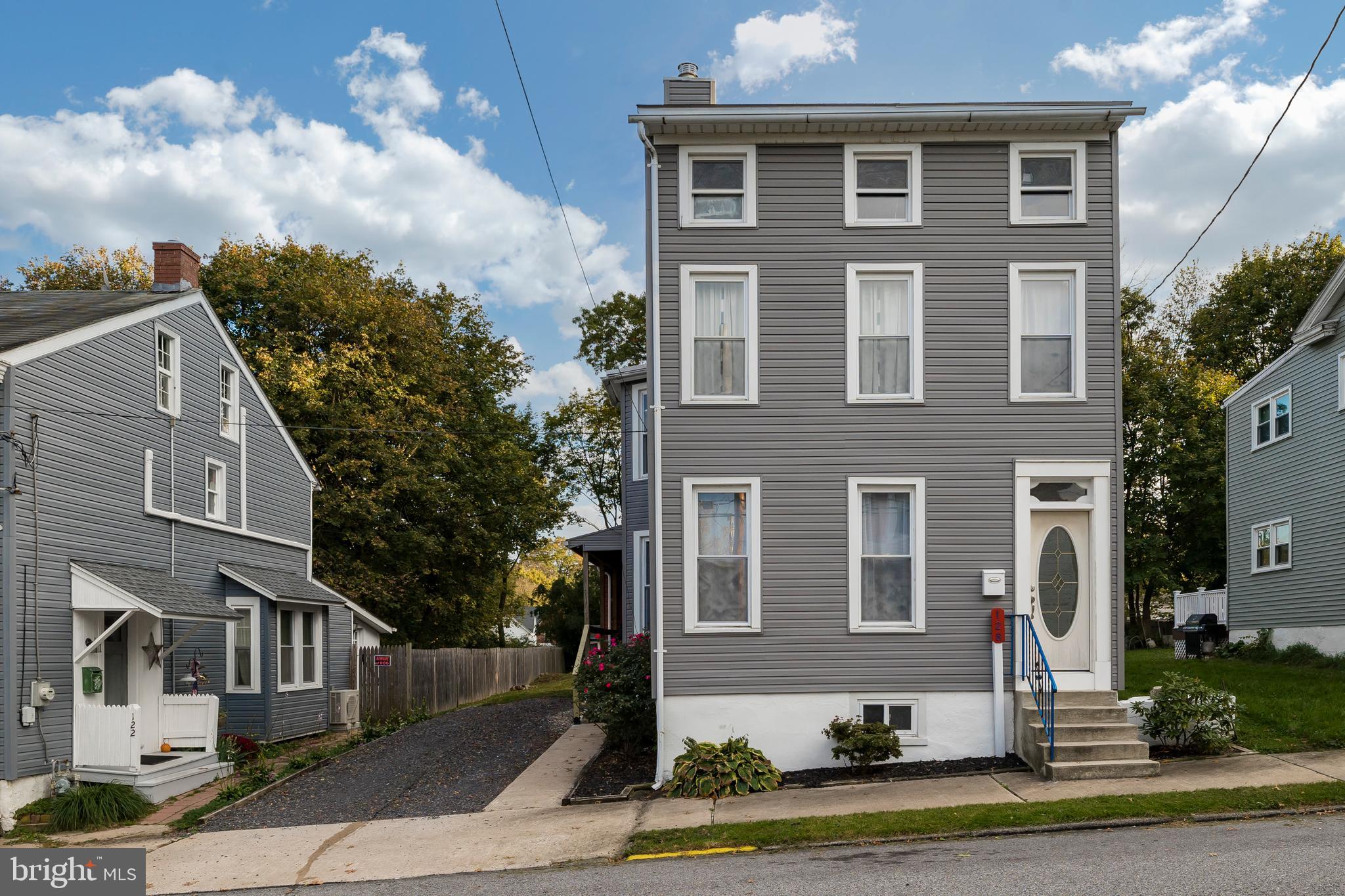 128 Chestnut Street Spring City, PA 19475 - Photo 2 of 32 a front view of a house with a yard