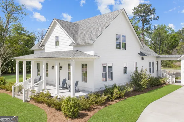 a front view of a house with patio