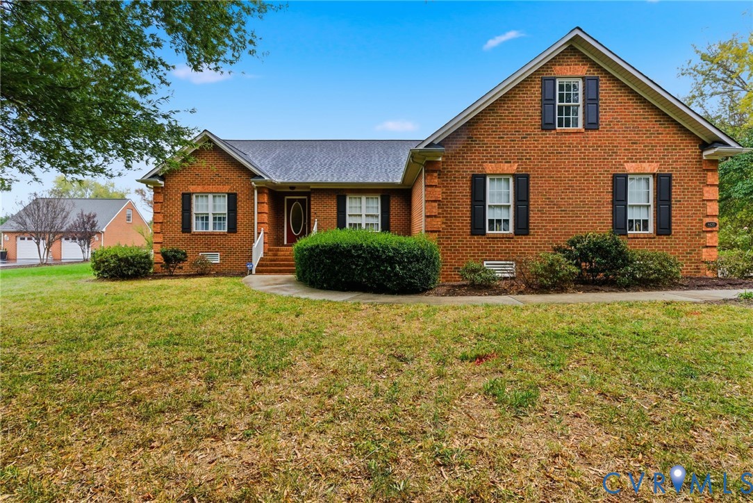 8420 Lee Davis Road Mechanicsville, VA 23116 - Photo 1 of 45 a front view of house with yard and green space