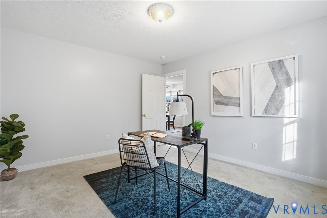 8420 Lee Davis Road Mechanicsville, VA 23116 - Photo 15 of 45 a table and chairs in a room