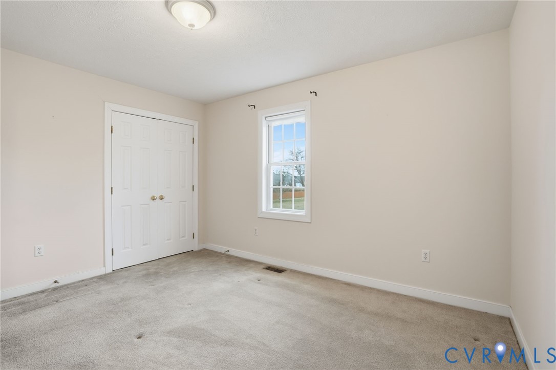 8420 Lee Davis Road Mechanicsville, VA 23116 - Photo 26 of 45 an empty room with a window